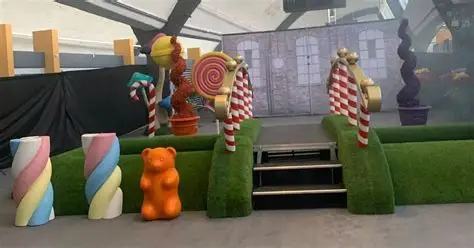 Barbie Dream Fest venue in Florida showing sparse decorations and minimal attractions after attendees reported disappointment and compared it to a viral Glasgow event.