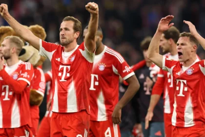 Bayern Munich players celebrating Bundesliga title win at Allianz Arena