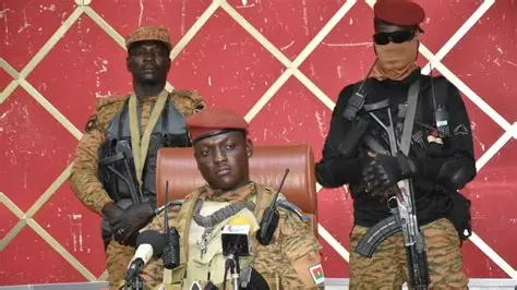 Capt Ibrahim Traoré speaks passionately on state television, rejecting democracy and promoting Burkina Faso's revolutionary path.