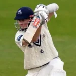 Zak Crawley bats for Kent during a County Championship match, showcasing his opening stance against Durham bowlers.