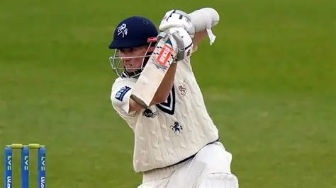 Zak Crawley bats for Kent during a County Championship match, showcasing his opening stance against Durham bowlers.