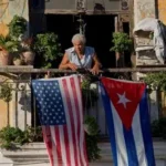 Cuban authorities escort prisoners during release in Havana