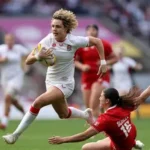 Ellie Kildunne playing rugby for England during a match