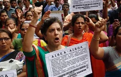 Factory workers protesting on streets in Noida India demanding higher wages