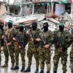 Gaza conflict aftermath with damaged buildings amid stalled peace talks