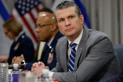 Defence Secretary Pete Hegseth speaks at Pentagon podium announcing Army Chief Randy George's immediate retirement.