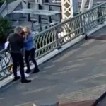 A woman and child jump from a rooftop to escape a mass shooting in Shreveport, Louisiana.