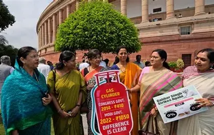 Women form human chain supporting Prime Minister Narendra Modi's women's reservation bill during public rally.