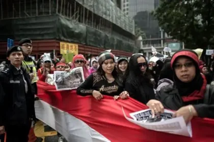 Indonesian domestic workers celebrate after parliament passes new protection law for domestic workers after 22 years