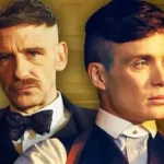 Jamie Bell as Duke Shelby stares intensely in 1950s attire, flat cap shadowing his face against Birmingham's gritty backdrop.