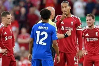 Liverpool manager Arne Slot discusses transfer targets during press conference amid summer window rumors.