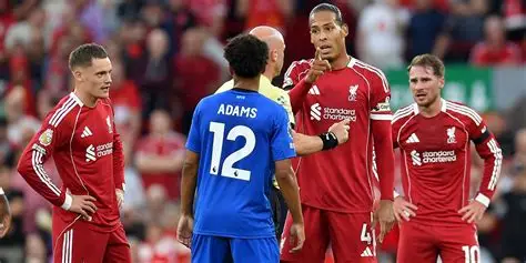 Liverpool manager Arne Slot discusses transfer targets during press conference amid summer window rumors.