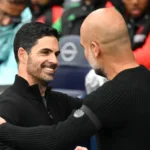Pep Guardiola and Mikel Arteta during Premier League match between Manchester City and Arsenal