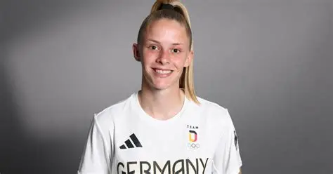 Germany forward Vivien Endemann celebrates goal for Wolfsburg during Women's Champions League match against Manchester United.