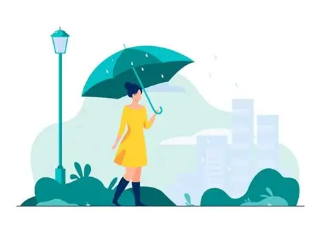Person walking in light rain enjoying fresh air and calm environment