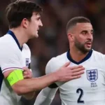 Harry Maguire reacting after being shown a red card during a Premier League match