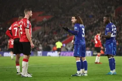 Football player pulling opponent’s hair during Premier League match incident