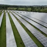 Solar panels installed on farmland near a rural village in North Yorkshire