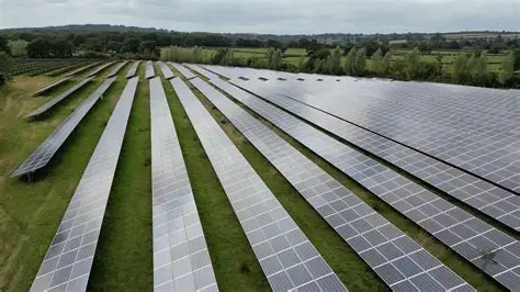 Solar panels installed on farmland near a rural village in North Yorkshire