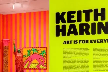 Keith Haring pop art figures displayed on clothing in retail store