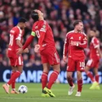 Arne Slot speaking to referee during Liverpool vs PSG match