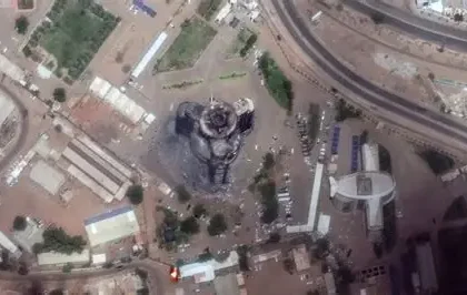 Mohamed Suleiman, emaciated Sudanese journalist, holds phone displaying backlog of war death messages after escaping el-Fasher RSF siege.