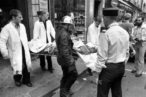 Police presence near Rue des Rosiers in Paris after historic restaurant attack investigation