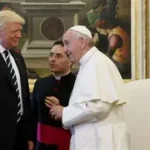 Donald Trump speaking during a public political event with religious backdrop