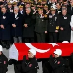 People mourning outside school after deadly shooting in Kahramanmaras Turkey