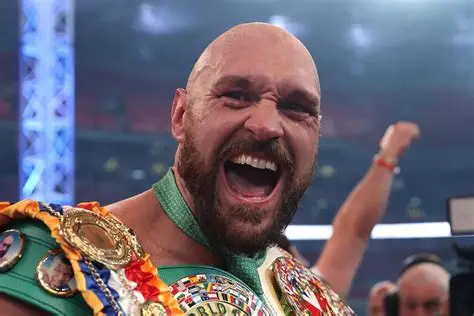 Tyson Fury celebrates victory over Arslanbek Makhmudov at Tottenham Hotspur Stadium as Netflix crowd roars during comeback fight.