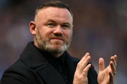 Wayne Rooney and Roy Hodgson during England match on touchline