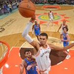Victor Wembanyama scoring during NBA playoff debut for San Antonio Spurs