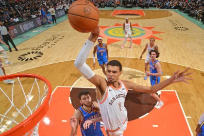 Victor Wembanyama scoring during NBA playoff debut for San Antonio Spurs