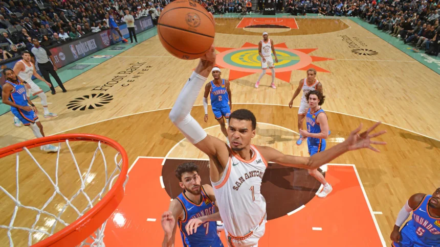 Victor Wembanyama scoring during NBA playoff debut for San Antonio Spurs