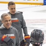 Mark Carney and Alexander Stubb play hockey