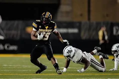 Missouri Tigers running back Ahmad Hardy during college football game action