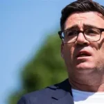Andy Burnham appears alongside Keir Starmer during Ashton-under-Lyne visit April 2026