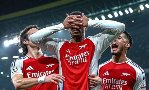 Arsenal players celebrate Premier League title win at Emirates Stadium at 5am in 2025