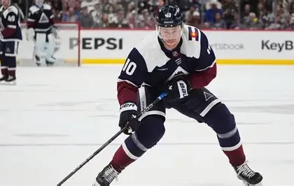Charlie Coyle in a Columbus Blue Jackets jersey after signing a long-term contract extension.