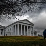 Federal agents outside Virginia Senator Louise Lucas’ office during FBI search