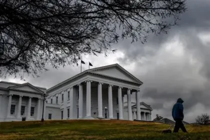 Federal agents outside Virginia Senator Louise Lucas’ office during FBI search