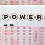 Powerball lottery ticket matches winning numbers May 18 4-13-34-61-65 Powerball 12 for $2 million