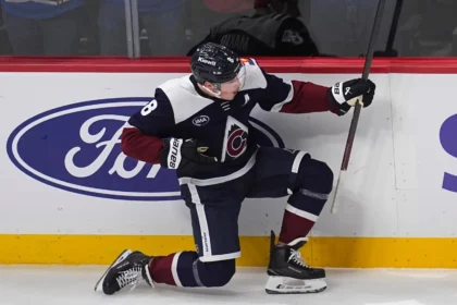 Cale Makar holds right arm after collisionGame 5 Minnesota sits out Avalanche Game 1