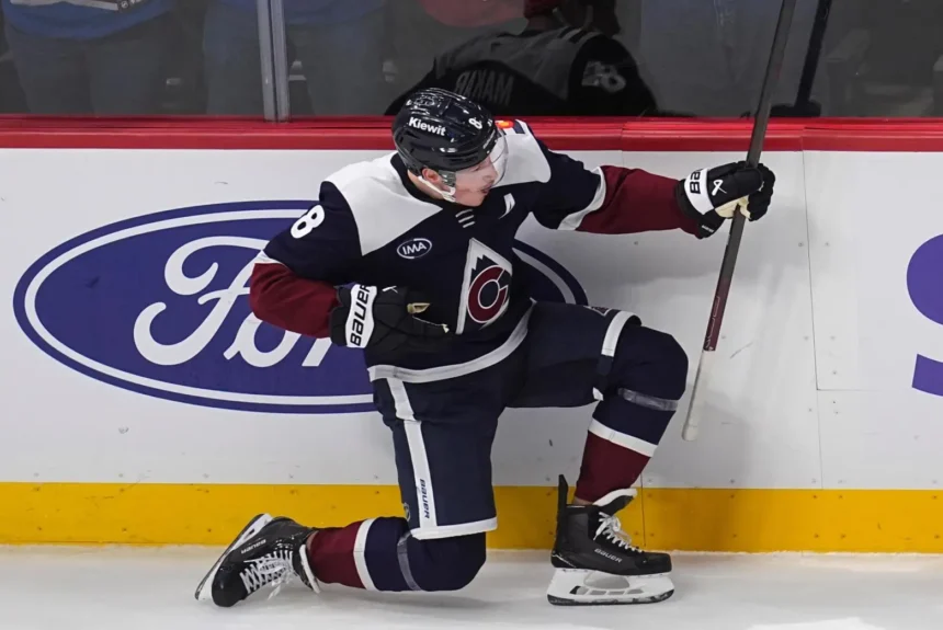 Cale Makar holds right arm after collisionGame 5 Minnesota sits out Avalanche Game 1