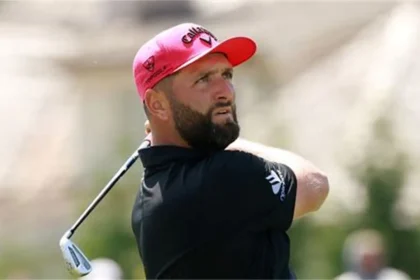Jon Rahm playing golf after resolving Ryder Cup eligibility dispute