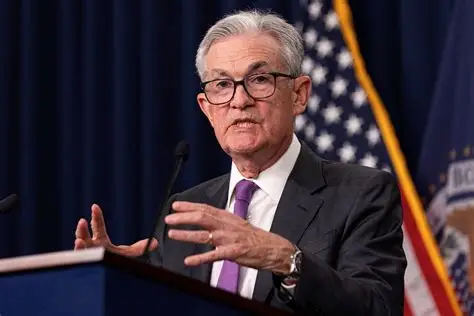 Federal Reserve Chair Jerome Powell speaks at a podium during his final days leading the U.S. central bank after eight years.