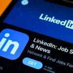 LinkedIn office building with employees discussing workforce restructuring and layoffs
