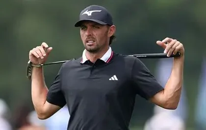Marco Penge preparing swing on golf course — Marco Penge health break