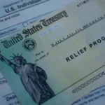 IRS COVID penalty refund paperwork and tax forms on a desk