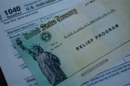 IRS COVID penalty refund paperwork and tax forms on a desk